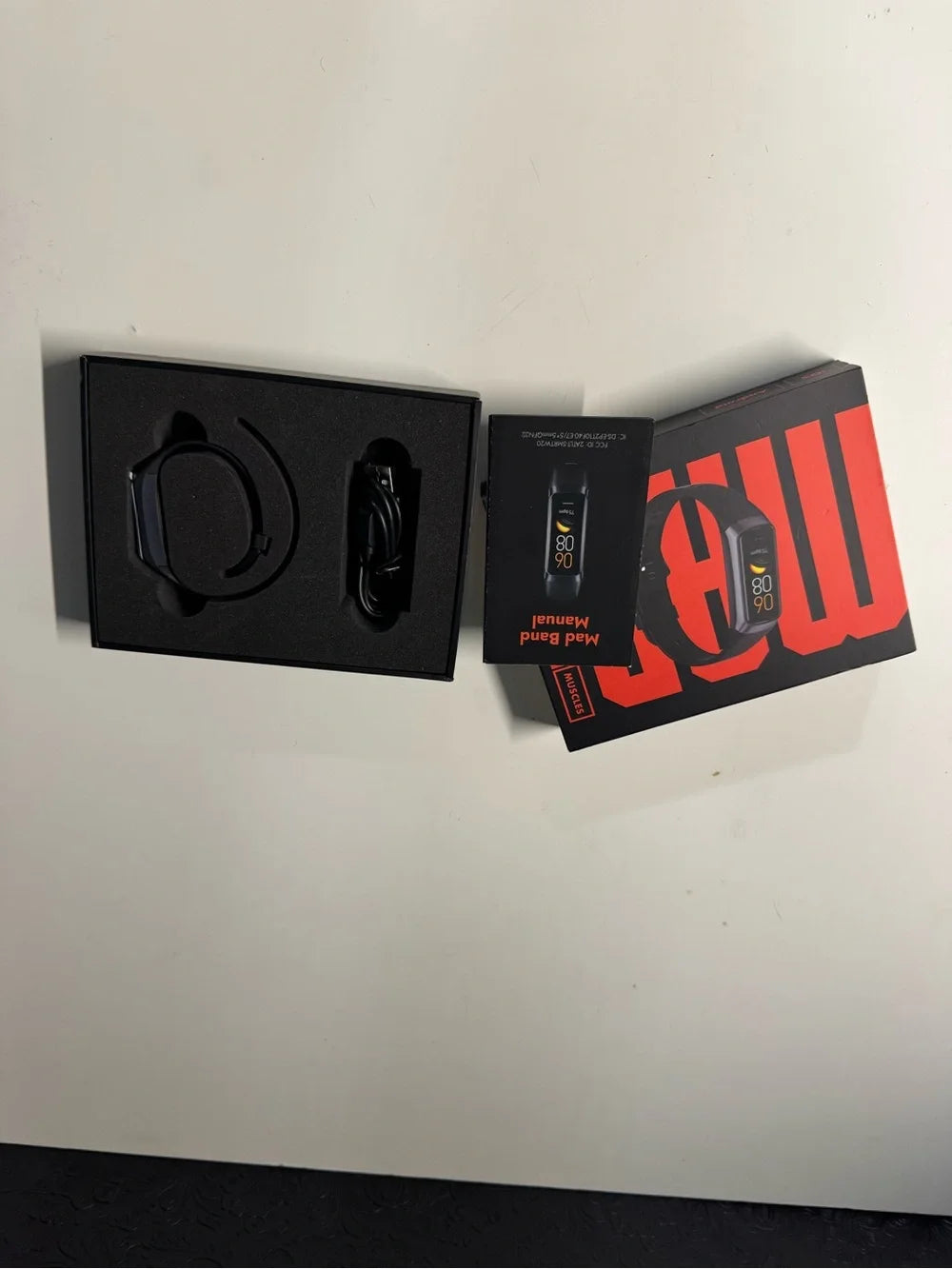 Black MadBand fitness tracker (New)