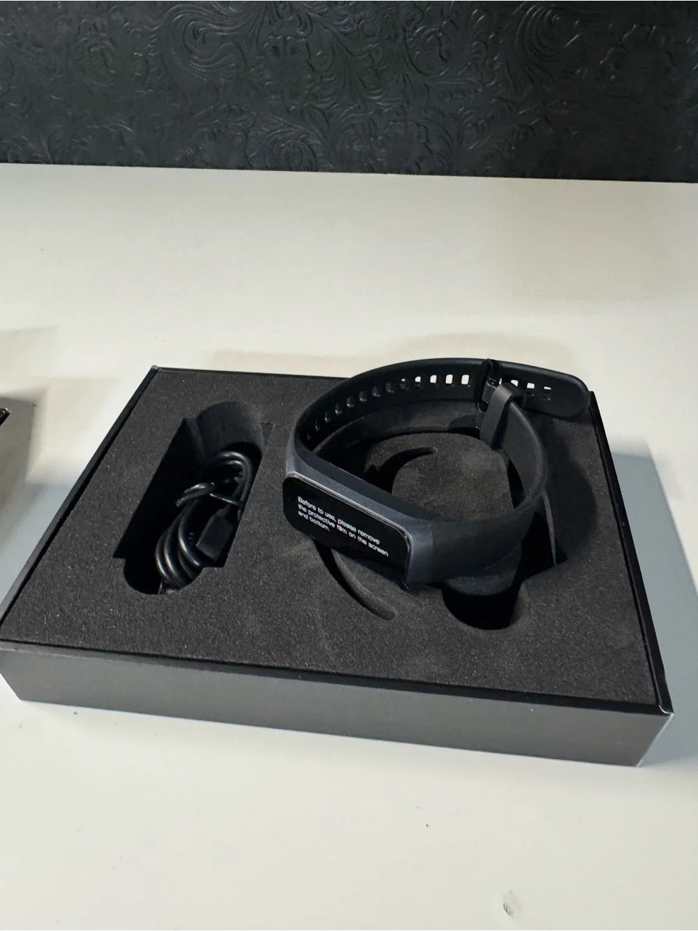 Black MadBand fitness tracker (New)